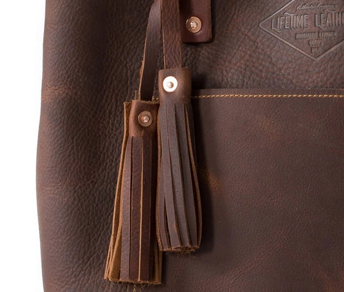 A nature brown color full-Grean leather bag showcasing the high-quality craftsmanship.