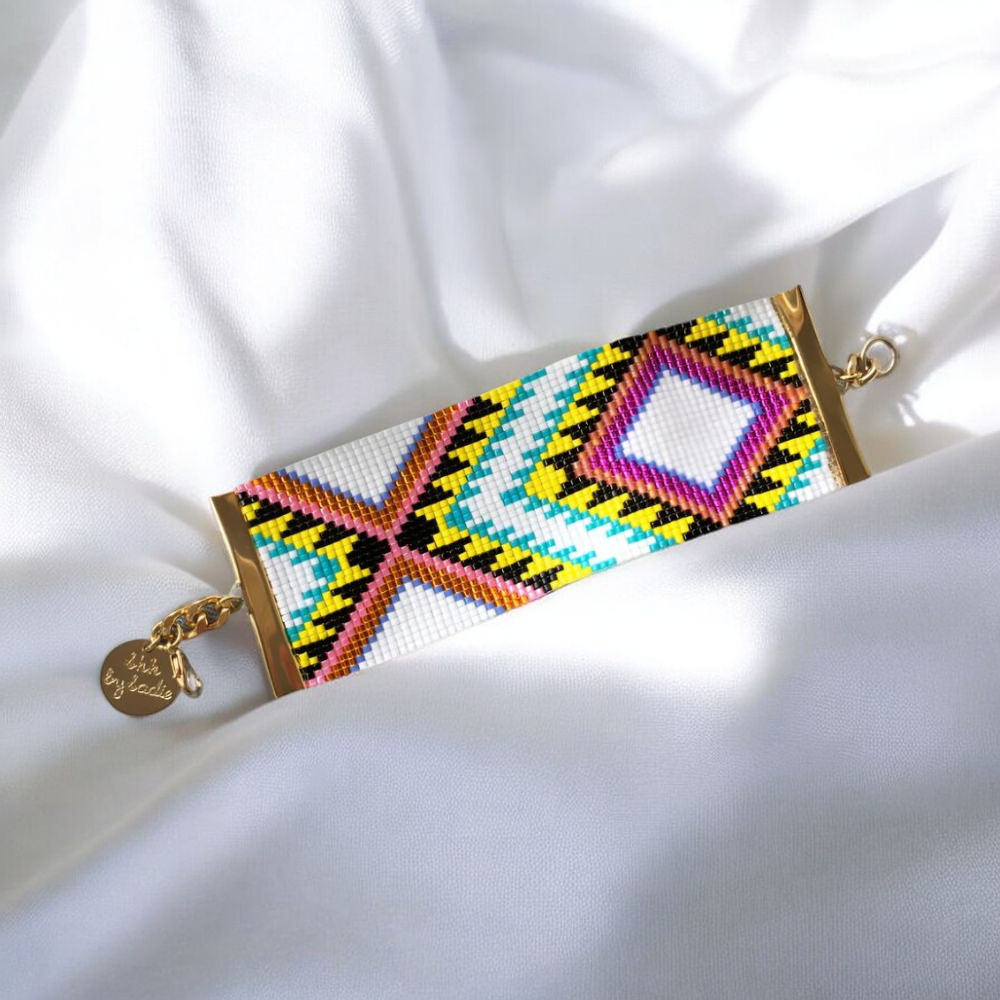 Handmade colorful woven bracelet by Sadie.