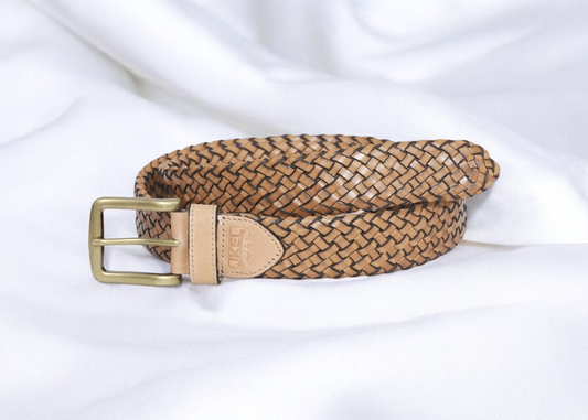 A stylish belt featuring a woven pattern and a shiny gold buckle, perfect for adding flair to any outfit.