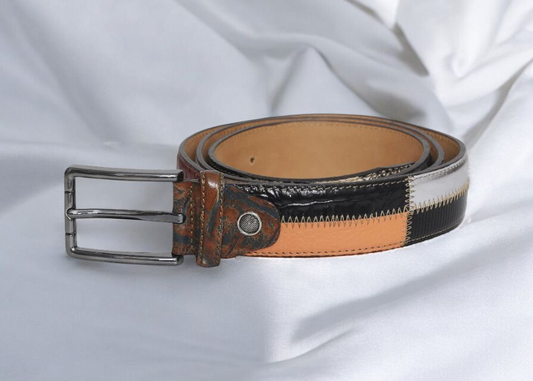 A belt featuring a stylish design with black, white, and orange stripes.