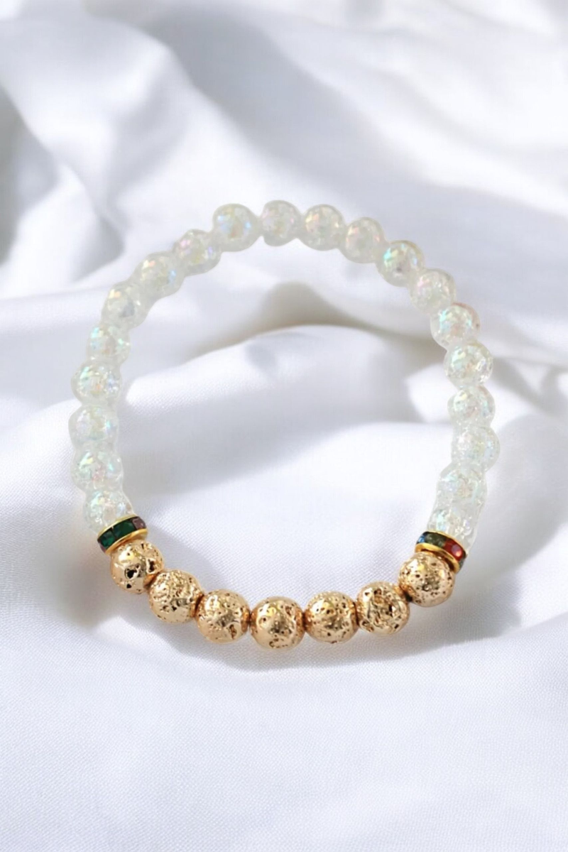 Elegant gold and white bracelet adorned with luminous white opal beads, exuding timeless luxury and sophistication.