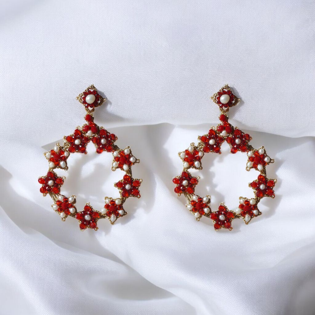 Elegant red and white flower earrings, showcasing exquisite craftsmanship and vibrant colors, perfect for any luxurious occasion.