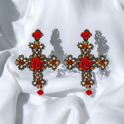  A stunning red rose cross necklace adorned with pearls and sparkling crystals, perfect for adding elegance to any outfit.