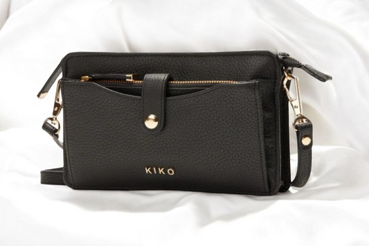 The Kiko crossbody bag in black, featuring a modern design ideal for everyday use and effortless style.