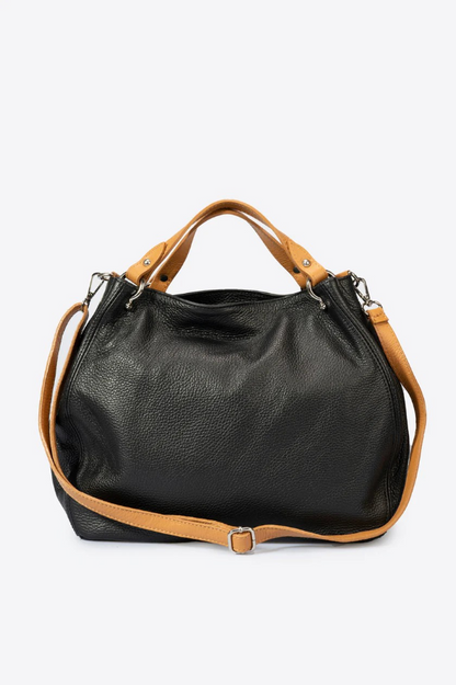 A sophisticated black leather bag featuring elegant tan handles, perfect for a touch of luxury in any ensemble.