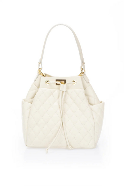  Elegant beige quilted handbag adorned with a luxurious gold chain, exuding sophistication and timeless style.