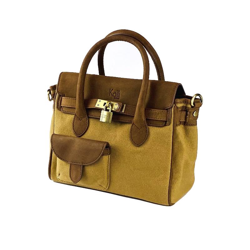 A tan and brown handbag featuring a stylish strap, perfect for everyday use and versatile fashion.