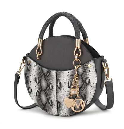 Elegant grey snake skin vegan bag featuring luxurious gold hardware and a stylish chain, perfect for any chic outfit.