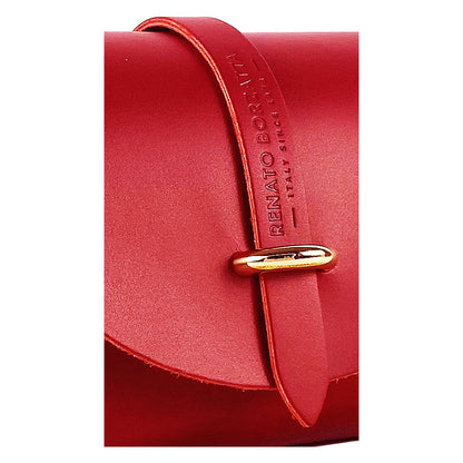 A red leather bag featuring a gold buckle and a gold chain, showcasing a stylish and elegant design.