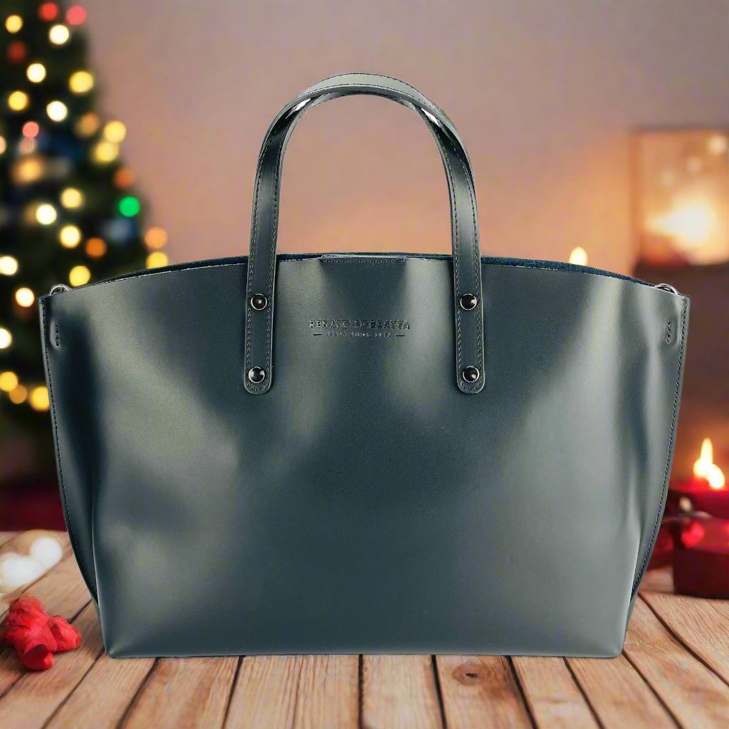 A sophisticated black leather tote bag elegantly displayed, showcasing its luxurious texture and timeless design.