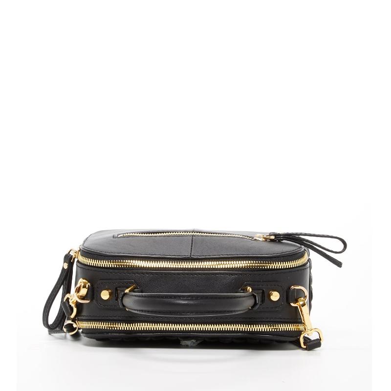 Small black crossbody purse featuring elegant gold hardware, two zipper, perfect for stylish and convenient everyday use.