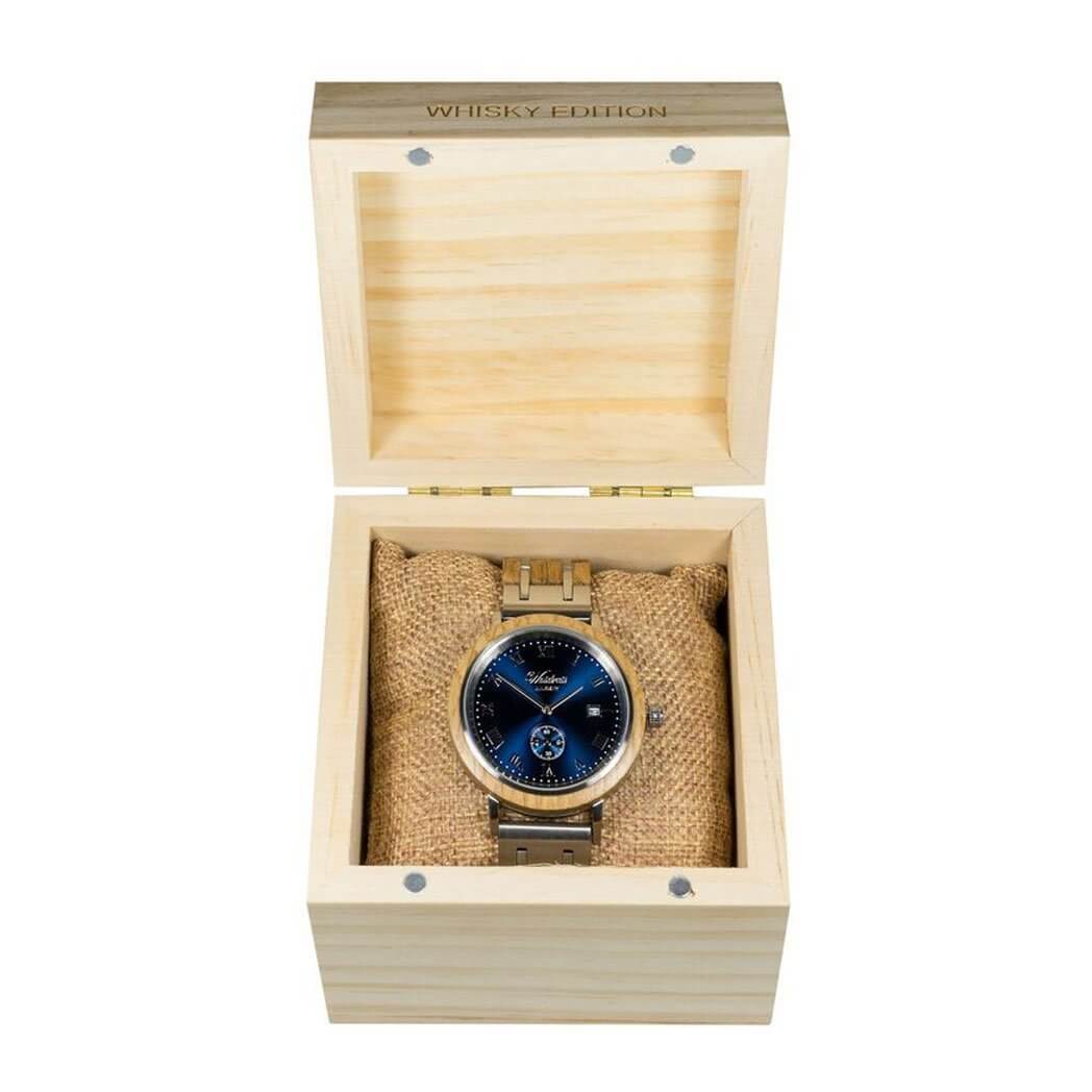 A wooden watch elegantly displayed inside a finely crafted wooden box, showcasing its natural beauty and craftsmanship.