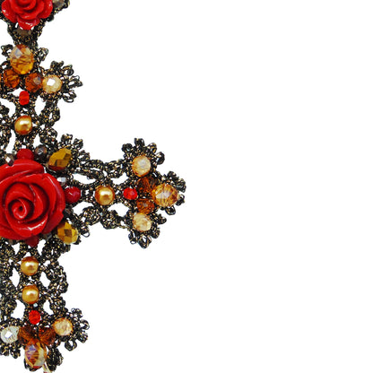  A beautiful red rose cross earrings embellished with pearls and crystals, showcasing a blend of elegance and charm.