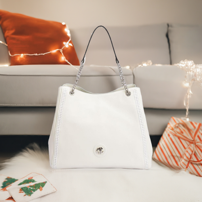  A stylish white handbag featuring elegant chain handles, perfect for any fashionable occasion.