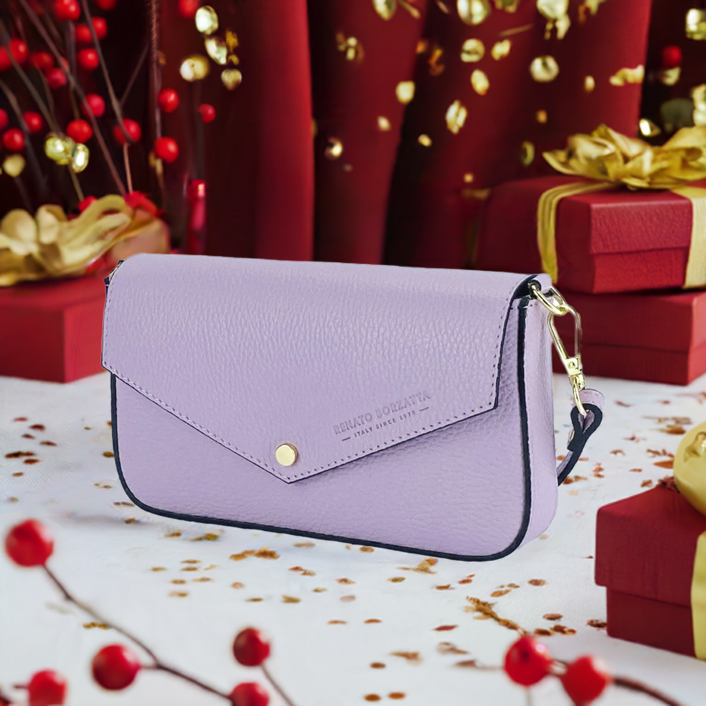 A purple leather crossbody bag featuring a stylish gold clasp, perfect for adding a pop of color to any outfit.