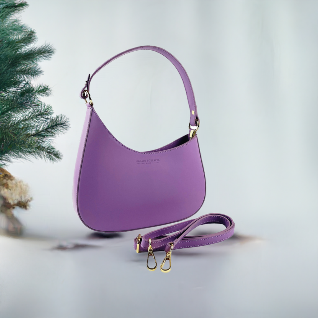  Exquisite purple leather bag with a chic strap and refined handle, embodying elegance and style for the discerning individual.