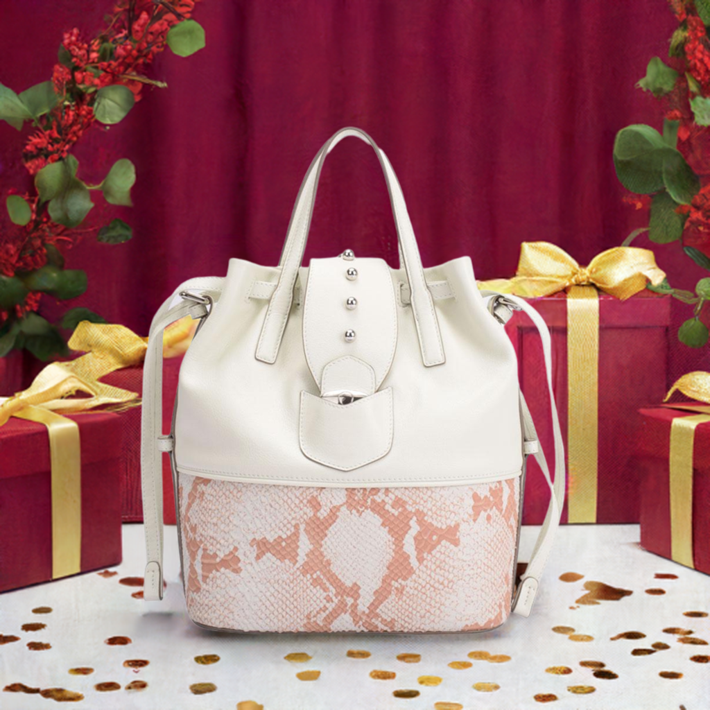 A white leather tote bag featuring a zipper pocket for secure storage and stylish organization.